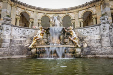 Hever Castle, England - April 2017 : Fountain in the Hevers Castle Italian garden, inspired by the Trevi fountain in Rome. Hever, Kent, Englandのeditorial素材