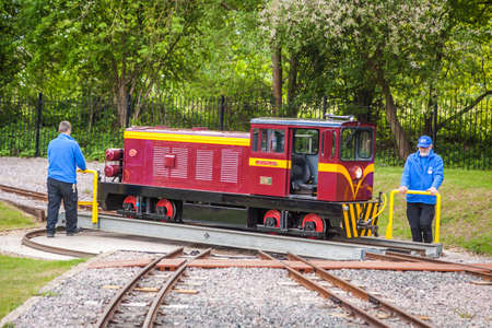 London, England - May 2017 : Narrow gauge tourist train locomotive changing railtracks, Ruislip Lido, London, UKのeditorial素材
