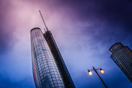 London, England - July 26, 2017 :  Boomerang scyscraper and the South Bank Tower at dusk, Londonのeditorial素材