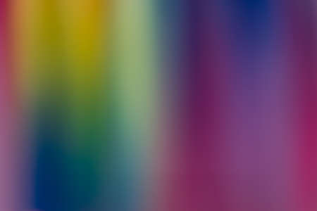 Intentionally blurred and defocused close-up of colorful textile threads pattern