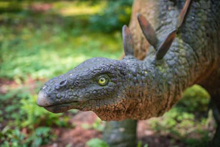 Solec Kujawski, Poland -  August 2017 :  Life sized Stegosaurus dinosaur statue in a forestのeditorial素材