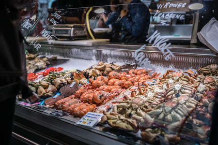 Bergen, Norway -  October 2017 :  Fresh seafood stalls on the indoor fish marketのeditorial素材