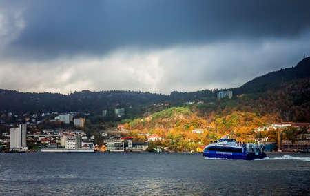 Bergen, Norway -  October 2017 : Fjords sightseeing cruise boat leaving Bergen harbour in autumn, Norwayのeditorial素材