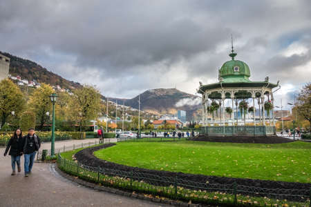 Bergen, Norway -  October 2017 : People walking on footpath near Gazebo in front of small Lille Lungegardsvannet lake in Bergen, Norwayのeditorial素材