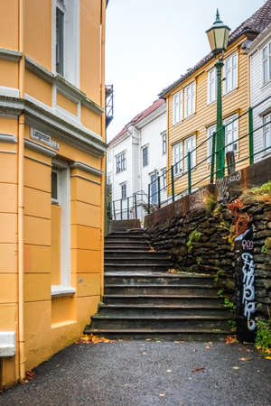 Traditional yellow and white houses in the old part of Bergen town, Norwayのeditorial素材