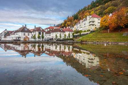 Bergen, Norway -  October 2017 :  Small lake reflection of the residential houses on the hillside in the old part of Bergen town, Norwayのeditorial素材