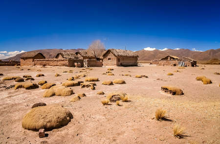 Homes in the small bolivian village on the way from Curahuara to La Junta near Oruro, Boliviaの写真素材