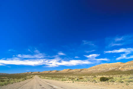 Famous Ruta 40 called also Ruta Quarenta passing through some impressive and strangely shaped mountains in Argentina, South Americaの写真素材