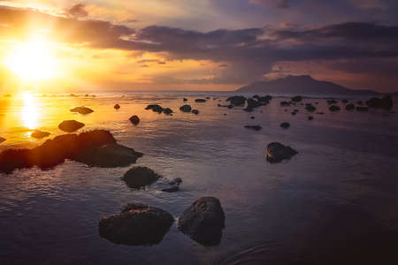 Sunset over the ocean as seen from the beach in Flores, East Nusa Tenggara, Indonesia, Asiaの写真素材