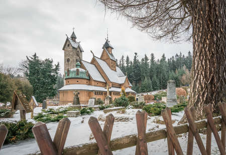 Karpacz, Poland -  February 2018 : The medieval Wang Temple photographed in winter. It is a...