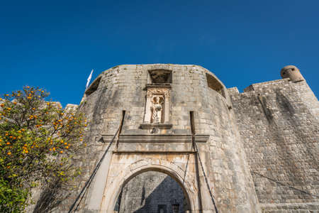 Massive thick stone gates to the historic Old Town in  Dubrovnik, Croatiaのeditorial素材
