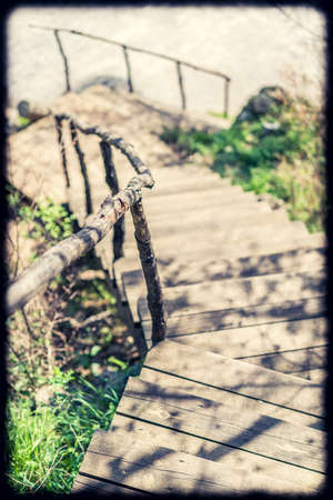 Wooden stairs footpath in the beautiful mountains of Montenegroの写真素材