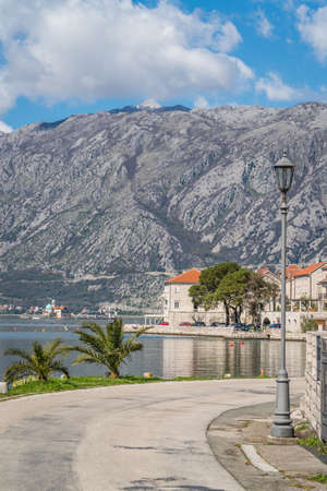Coastal main road in the beautiful Perast town in the Kotor Bay, Montenegroの写真素材