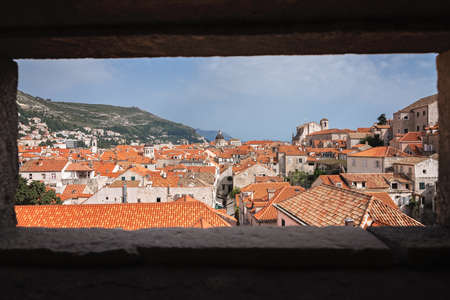 Rooftops of old houses and buildings in Dubrovnik, viewed from the Old Town fortified walls