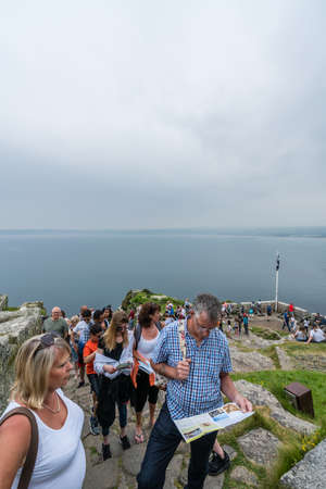 Marazion, England -  May 2018 : Tourists queueing to the entrance of the St Michaels Mount  fortress,  Cornwall, UKのeditorial素材