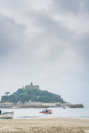 Marazion, England -  May 2018 : View from the sea of the St Michaels Mount island fortress,...