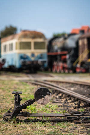 Old rusty manually operated switch on the rail tracksのeditorial素材