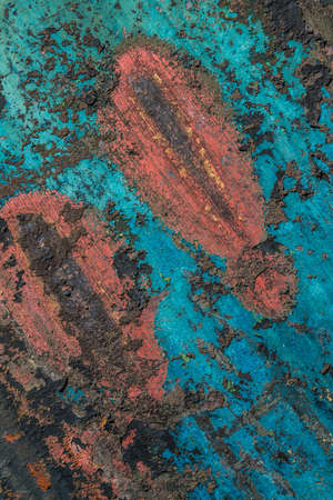 Close up of a red and blue dilapidated wall textured grunge background