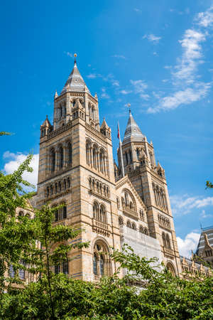 High towers of the impressive building of the Natural History Museum in London, England