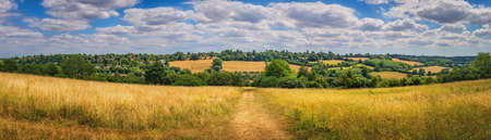 Hills, grassland and trees near Banstead woods in Surrey, Englandの写真素材