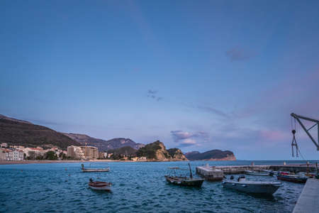 Petrovac, Montenegro - April 2018 : Motor boats in Petrovac Bay small port in spring