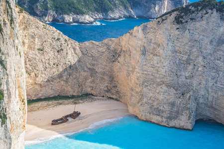 Wreck of a smugglers ship on the beach at the bottom of the stunning Shipwreck Cove, Zante Island, Greeceの写真素材