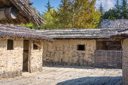 Reconstructed  old traditional huts in the Bay of the bones on water, authentic reconstruction of the pile dwelling settlement, Ohrid, Republic of Macedoniaの写真素材