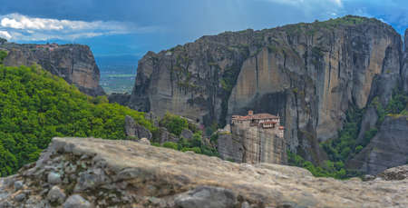 View of the stunningly located Roussanou monastery in Meteora valley, Greece