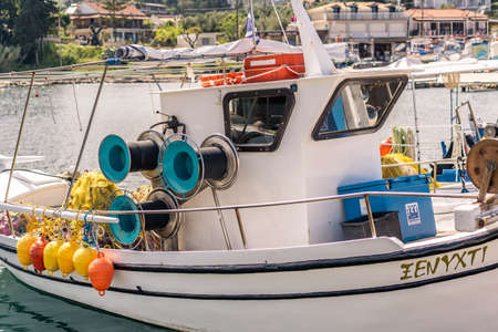 Zakynthos, Greece -  April 2019 : Small private fisherman boat moored in port near Keri beach in...