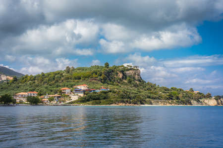 Zakynthos, Greece -  April 2019 : Hotels on the hills near Keri beach as seen from the sea, Zante Island, Ionian islandsのeditorial素材