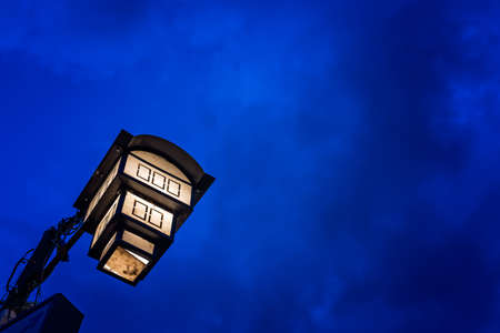 Street lamp lit at night in Ohrid town, Northern Macedoniaの写真素材