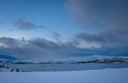 Panorama of a lake and mountain winter landscape with, Tromso region, Northern Norway