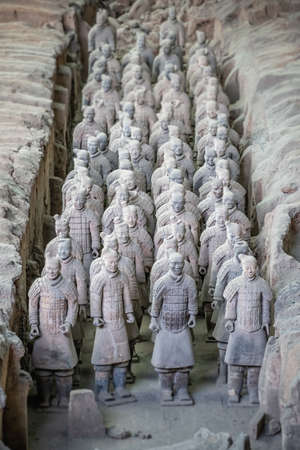 Xian, China -  July 2019 :  Standing clay soldiers forming part of an army of terracota warriors, created during the reign of first chinese emperor Qin Shi Huang Di, Shaanxi Provinceのeditorial素材
