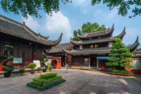 Chengdu, China -  July 2019 : Pilgrim or tourist walking in the courtyard of the Buddhist Wenshu Monastery, Chengdu, Sichuan Provinceのeditorial素材