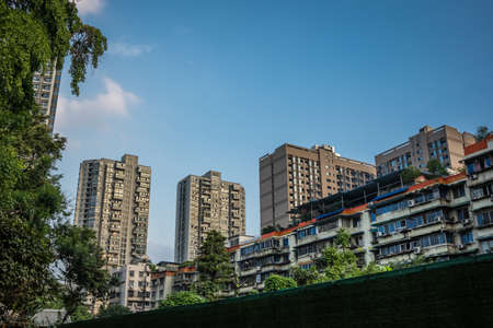 Town suburb with high residential buildings and blocks of flats in Chengdu, Chinaの写真素材
