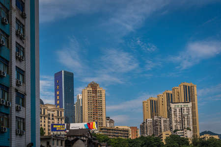 Chongqing, China -  August 2019 : Tall highrise residential and commercial buildings in the Jiefangbei district in the downtown of Chongqing city, Chinaのeditorial素材