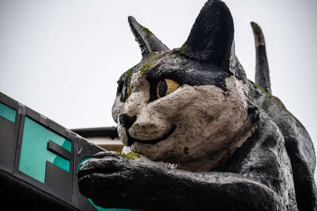 London, United Kingdom -  October 2019 : The giant fibreglass cat statue guarding the entrance to a shopping centre called the Catford Centre, Lewisham. It was designed, produced and installed in 1974 by one Owen Luder from a company called Embassy Signsのeditorial素材