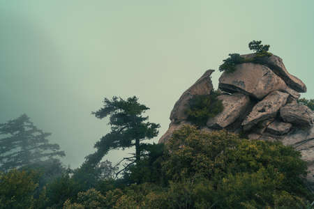 Pile of massive boulders on the summit of mountain landscape seen from the West Peak on Hua Shan mountain, Xian, Shaanxi Province, Chinaの写真素材