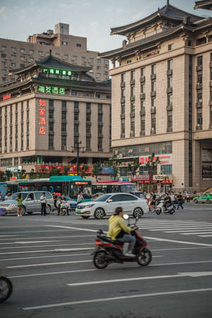 Xian, China -  August 2019 :  Road lanes and zebra crossing on a busy street in the city of Xian in summer, Shaanxi Provinceのeditorial素材