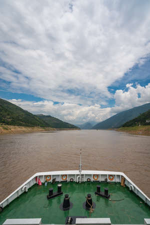 Yangtze River, China - August 2019 : Bow of the luxury passenger cruise ship sailing through the gorgeのeditorial素材