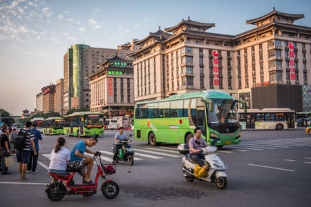 Xian, China -  August 2019 : Extremely busy street crossing and crossroad in the city of Xian in summer, Shaanxi Provinceのeditorial素材