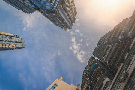 Tall highrise residential buildings in the Jiefangbei district in the downtown of Chongqing city, Chinaの写真素材
