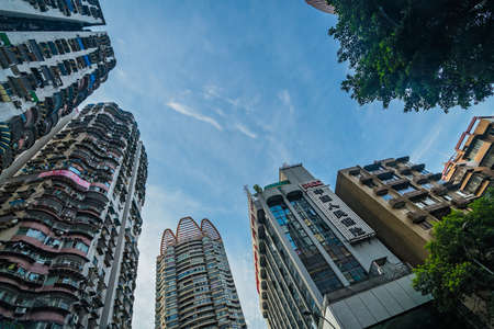 Chongqing, China -  August 2019 : View of the tall highrise residential and commercial buildings in the Jiefangbei district in the downtown of Chongqing cityのeditorial素材