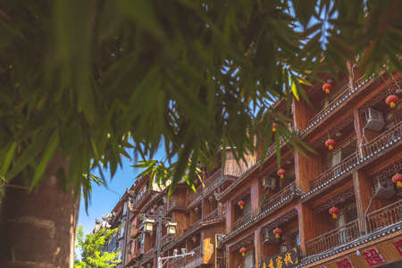 Feng Huang, China -  August 2019 : Close up of windows and balconies of old historic wooden Diaojiao houses it Feng huang Old Townのeditorial素材