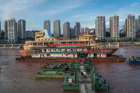 Chongqing, China - August 2019 : Luxury passenger cruise ship ready to depart from Chongqing wharf on a trip through the Three gorges on the Yangtze river in summerのeditorial素材