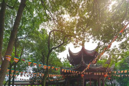 Leshan, China - July 2019 : Chinese pagoda in a Leshan Buddha Park in summer, Sichuan province