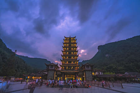 Zhangjiajie, China -  August 2019 : Crowds of people leaving the Wulingyuan exit to the Zhangjiajie national park in the evening, Hunan Provinceのeditorial素材
