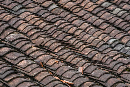 Roof tiles on an historic old building in Fenghuang Old Town, Hunan Province, China