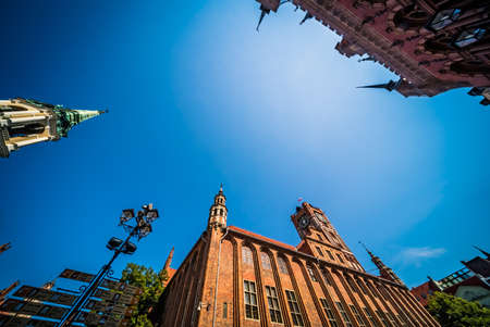 Torun, Poland - August 2020 : A low angle shot of the Clock Tower of Ratusz building