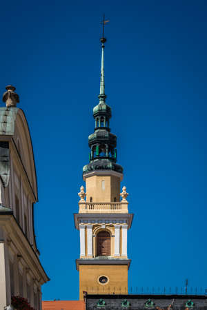 A vertical shot of an ancient church tower in Swiebodzice, Polandの写真素材